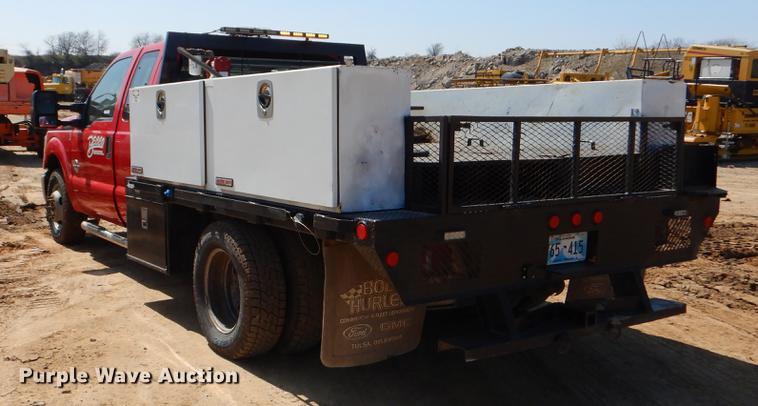 image for item EJ9905 2011 Ford F350 Super Duty SuperCab flatbed pickup truck