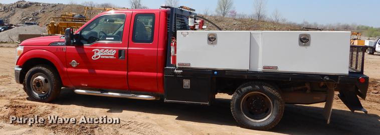 image for item EJ9905 2011 Ford F350 Super Duty SuperCab flatbed pickup truck