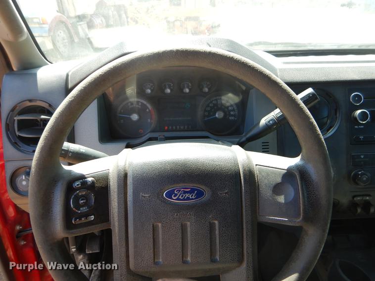 image for item EJ9905 2011 Ford F350 Super Duty SuperCab flatbed pickup truck