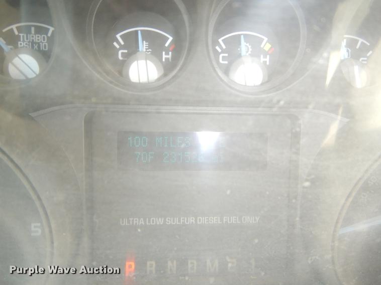 image for item EJ9905 2011 Ford F350 Super Duty SuperCab flatbed pickup truck