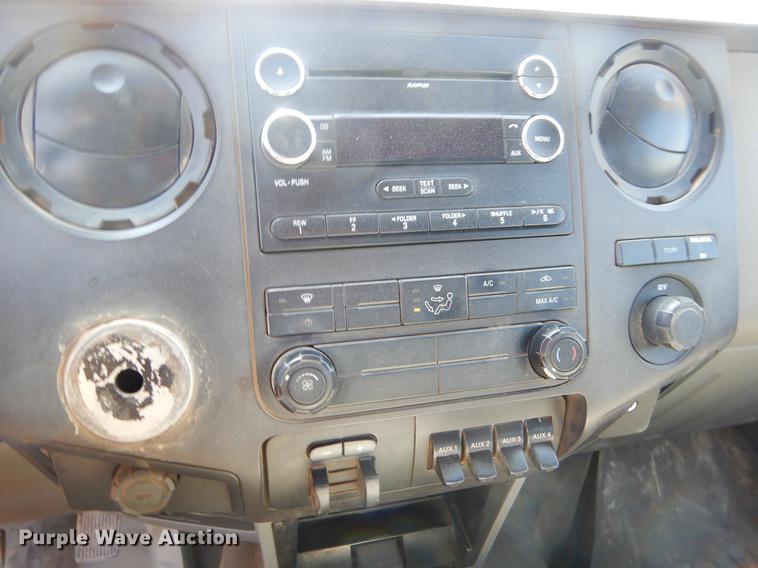 image for item EJ9905 2011 Ford F350 Super Duty SuperCab flatbed pickup truck