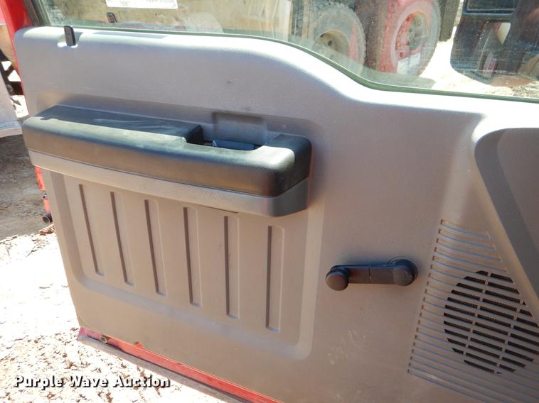 image for item EJ9905 2011 Ford F350 Super Duty SuperCab flatbed pickup truck