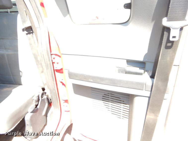 image for item EJ9905 2011 Ford F350 Super Duty SuperCab flatbed pickup truck