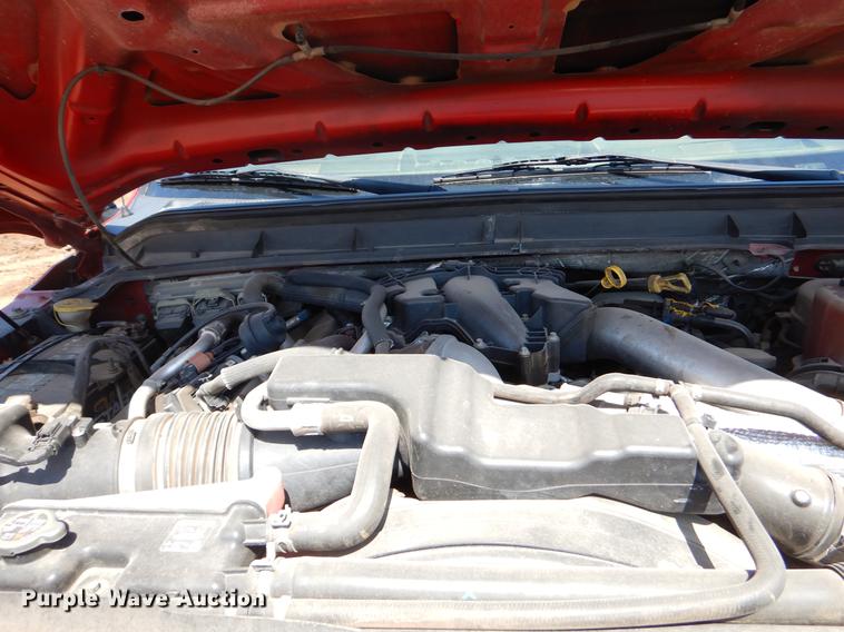 image for item EJ9905 2011 Ford F350 Super Duty SuperCab flatbed pickup truck