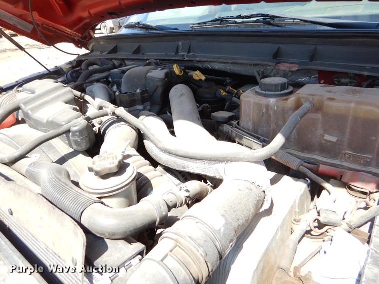 image for item EJ9905 2011 Ford F350 Super Duty SuperCab flatbed pickup truck