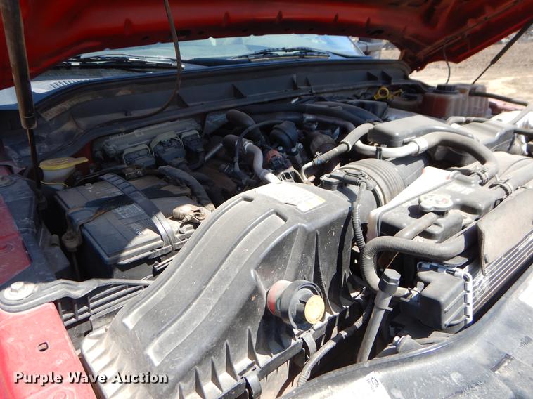 image for item EJ9905 2011 Ford F350 Super Duty SuperCab flatbed pickup truck