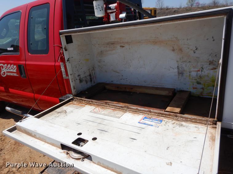 image for item EJ9905 2011 Ford F350 Super Duty SuperCab flatbed pickup truck