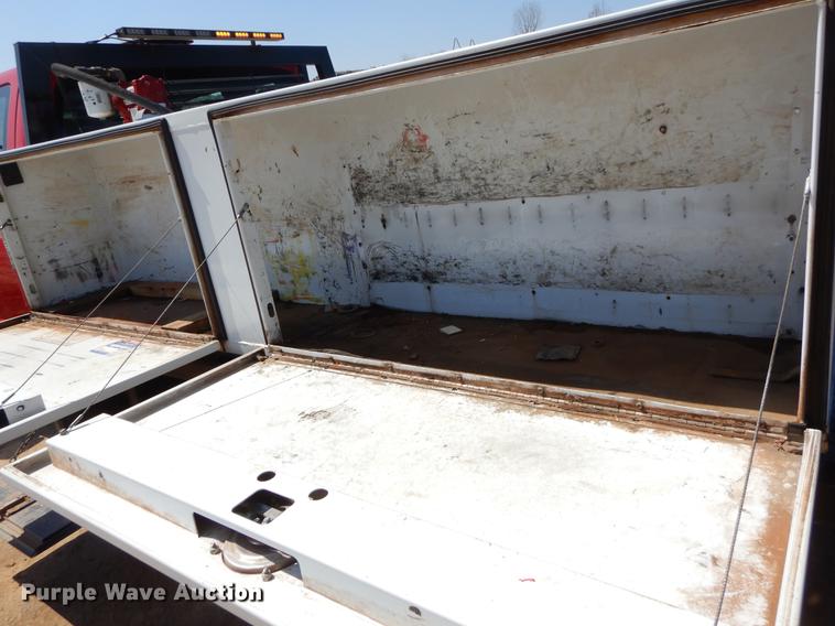 image for item EJ9905 2011 Ford F350 Super Duty SuperCab flatbed pickup truck