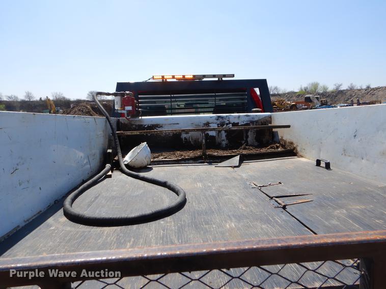 image for item EJ9905 2011 Ford F350 Super Duty SuperCab flatbed pickup truck