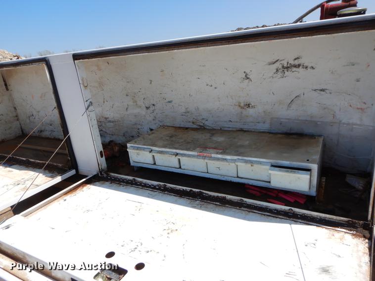 image for item EJ9905 2011 Ford F350 Super Duty SuperCab flatbed pickup truck