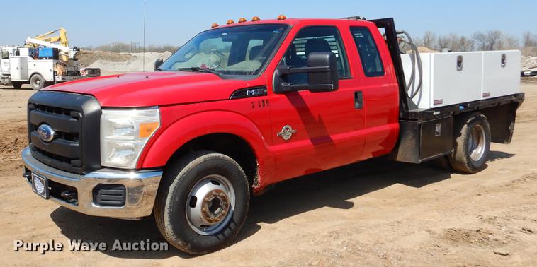image for item EJ9910 2011 Ford F350 Super Duty SuperCab flatbed pickup truck