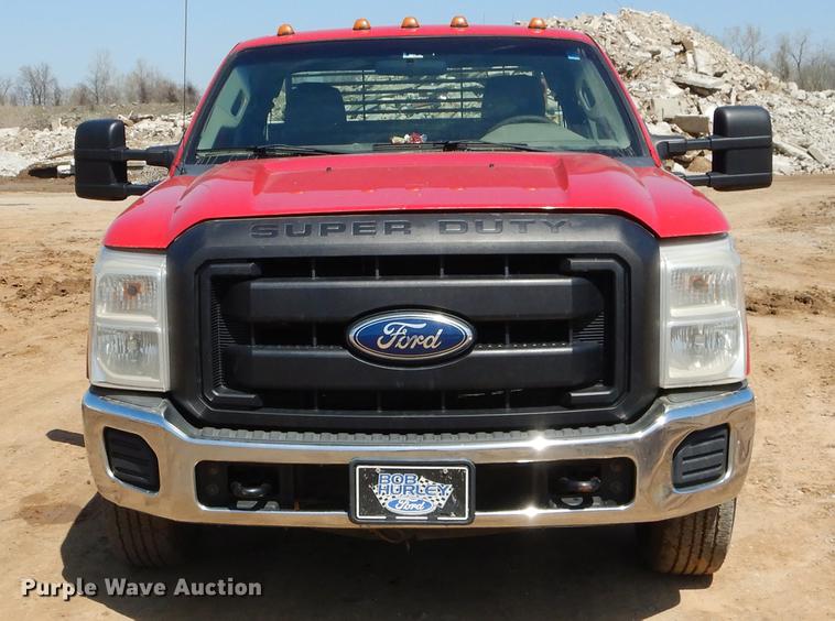 image for item EJ9910 2011 Ford F350 Super Duty SuperCab flatbed pickup truck