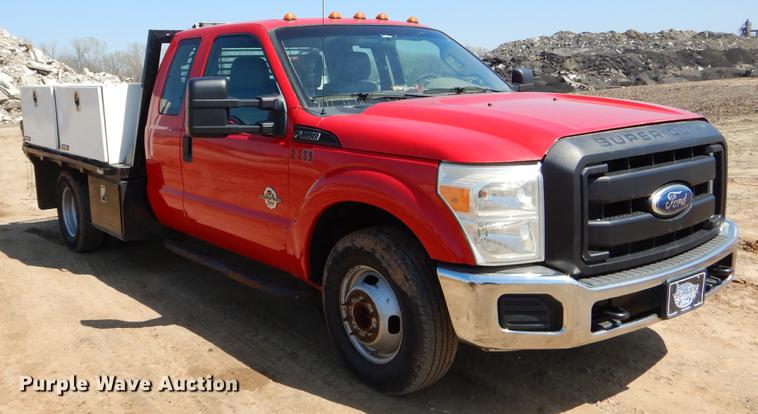 image for item EJ9910 2011 Ford F350 Super Duty SuperCab flatbed pickup truck