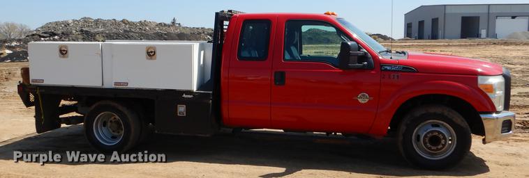 image for item EJ9910 2011 Ford F350 Super Duty SuperCab flatbed pickup truck