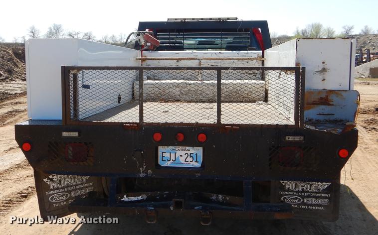 image for item EJ9910 2011 Ford F350 Super Duty SuperCab flatbed pickup truck