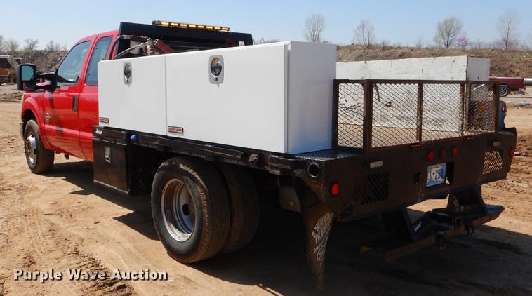 image for item EJ9910 2011 Ford F350 Super Duty SuperCab flatbed pickup truck