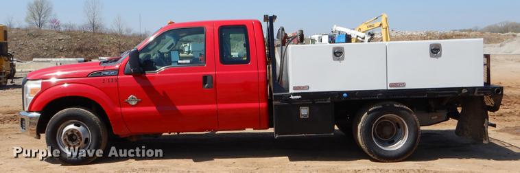 image for item EJ9910 2011 Ford F350 Super Duty SuperCab flatbed pickup truck