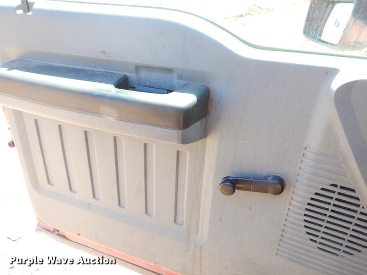 image for item EJ9910 2011 Ford F350 Super Duty SuperCab flatbed pickup truck