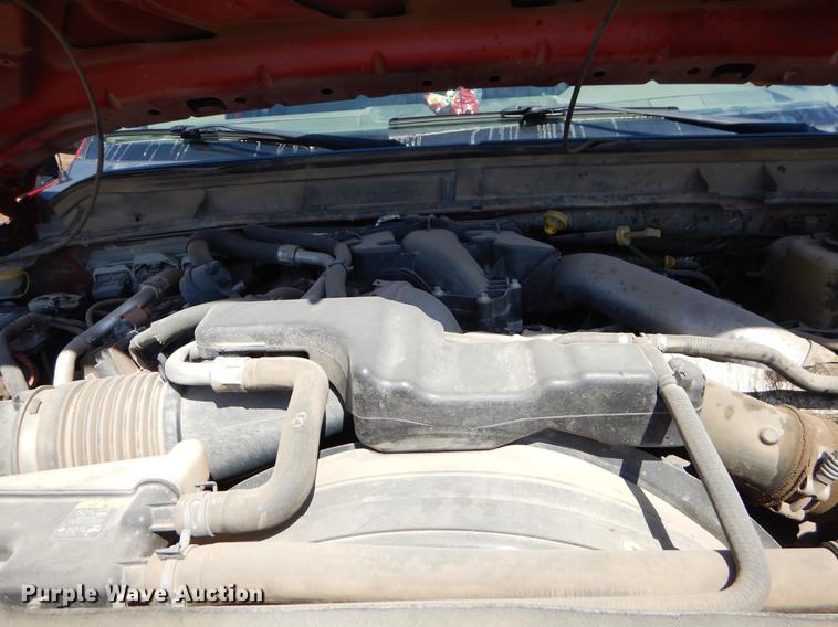 image for item EJ9910 2011 Ford F350 Super Duty SuperCab flatbed pickup truck