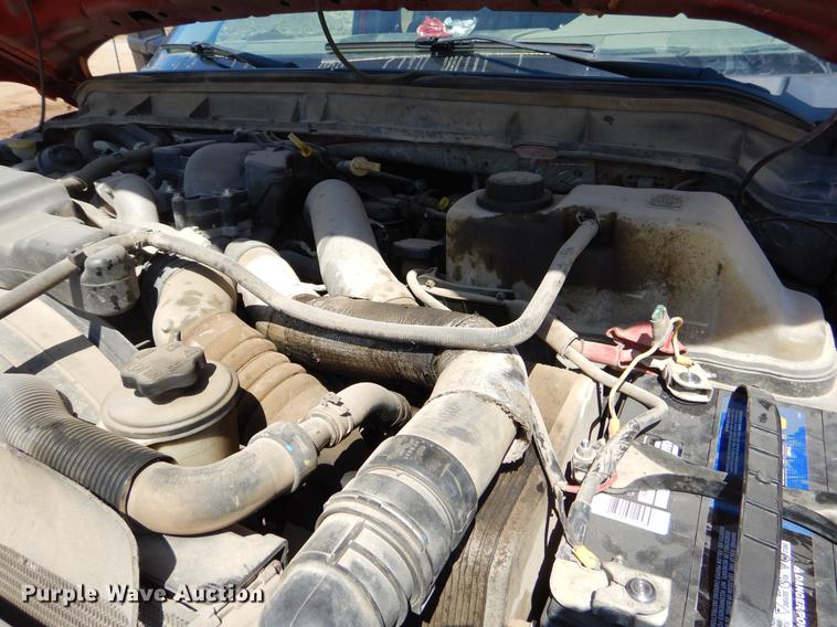 image for item EJ9910 2011 Ford F350 Super Duty SuperCab flatbed pickup truck