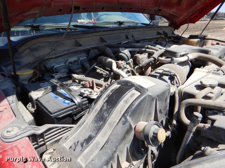 image for item EJ9910 2011 Ford F350 Super Duty SuperCab flatbed pickup truck