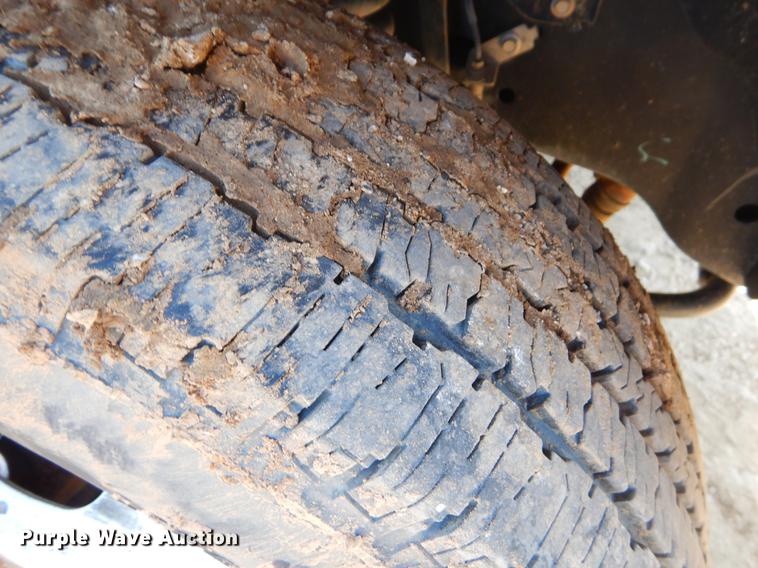 image for item EJ9910 2011 Ford F350 Super Duty SuperCab flatbed pickup truck