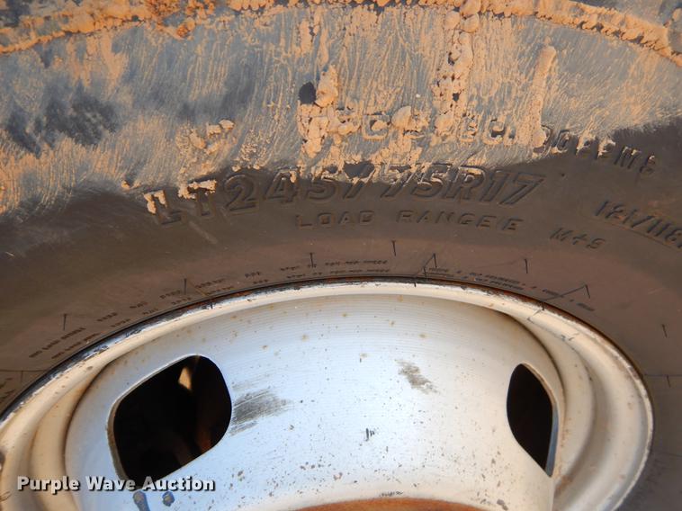 image for item EJ9910 2011 Ford F350 Super Duty SuperCab flatbed pickup truck