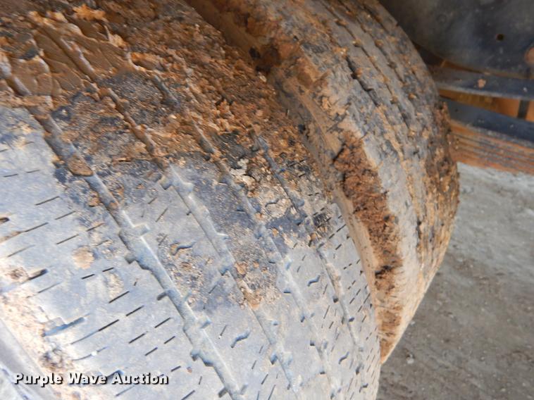 image for item EJ9910 2011 Ford F350 Super Duty SuperCab flatbed pickup truck