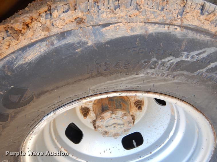 image for item EJ9910 2011 Ford F350 Super Duty SuperCab flatbed pickup truck