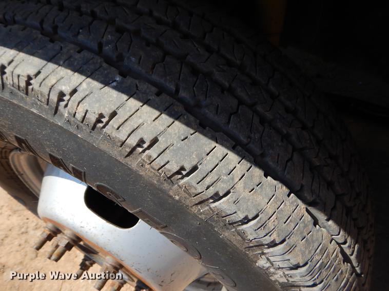 image for item EJ9910 2011 Ford F350 Super Duty SuperCab flatbed pickup truck