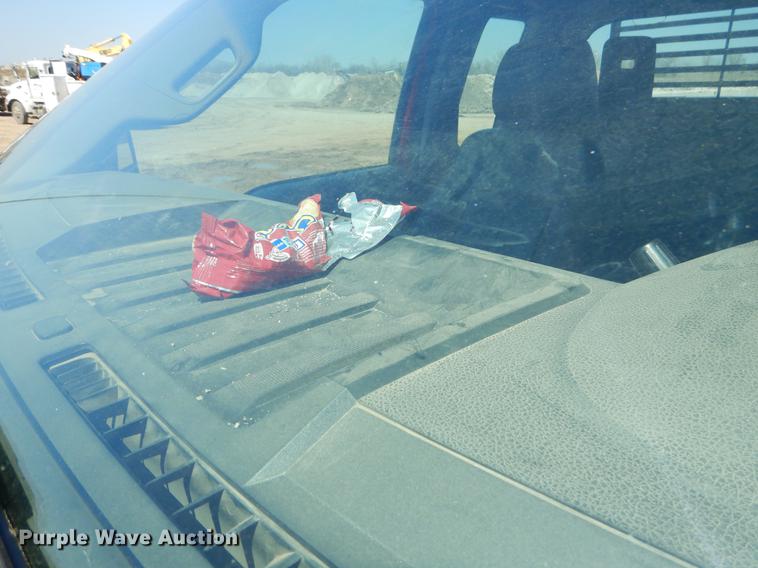 image for item EJ9910 2011 Ford F350 Super Duty SuperCab flatbed pickup truck