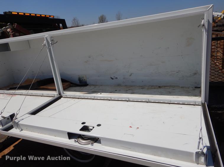 image for item EJ9910 2011 Ford F350 Super Duty SuperCab flatbed pickup truck