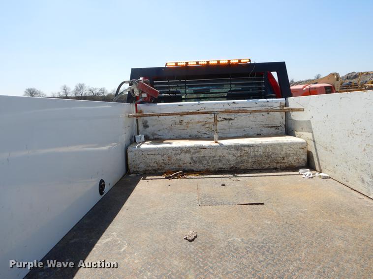 image for item EJ9910 2011 Ford F350 Super Duty SuperCab flatbed pickup truck