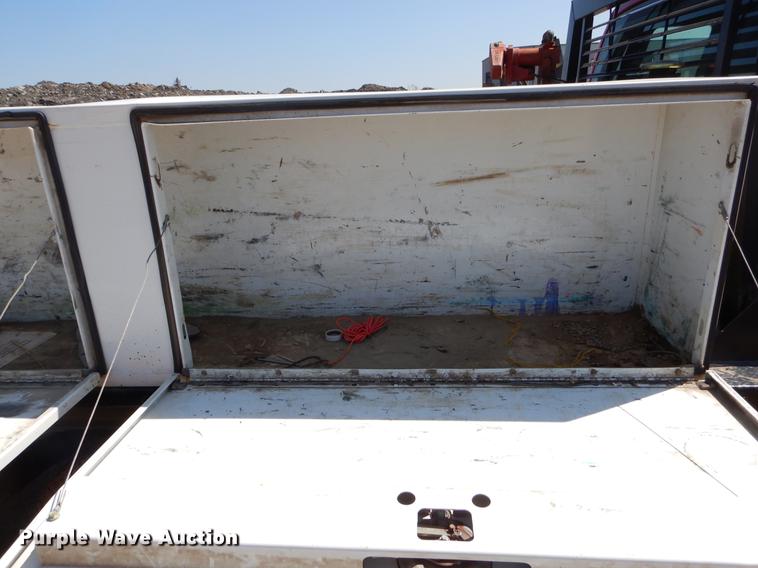 image for item EJ9910 2011 Ford F350 Super Duty SuperCab flatbed pickup truck