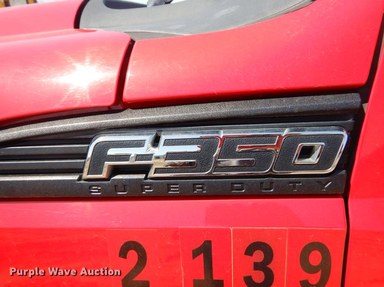 image for item EJ9910 2011 Ford F350 Super Duty SuperCab flatbed pickup truck