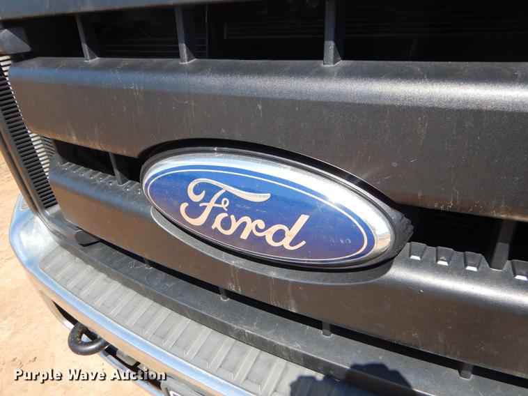 image for item EJ9910 2011 Ford F350 Super Duty SuperCab flatbed pickup truck