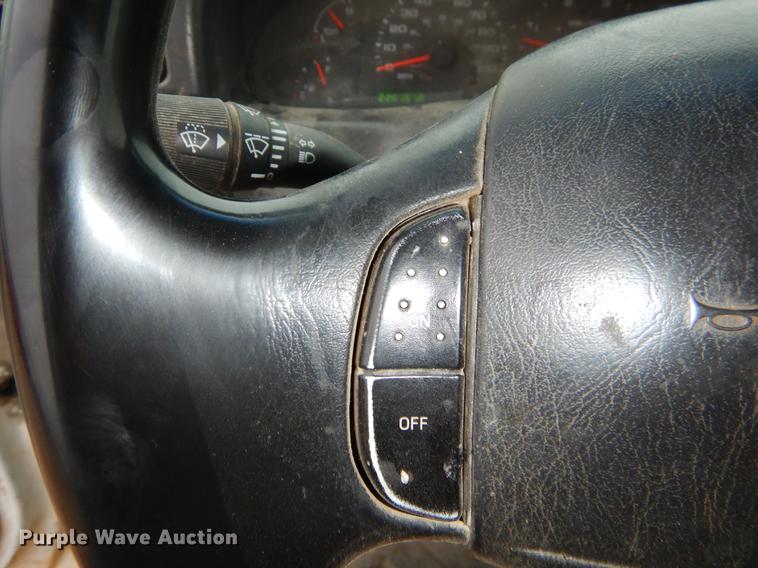 image for item EJ9915 2004 Ford F350 Super Duty SuperCab flatbed pickup truck