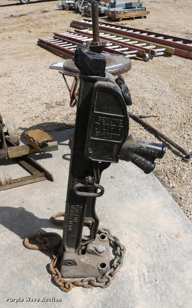 image for item EW9109 Tire repair machine, jack, and hydraulic lifts