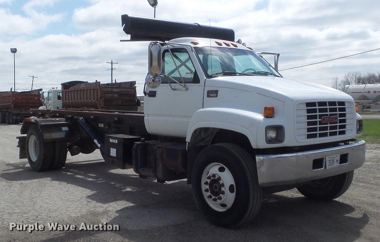 image for item DC7367 1999 GMC C7500 roll-off container truck