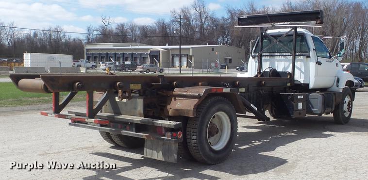image for item DC7367 1999 GMC C7500 roll-off container truck
