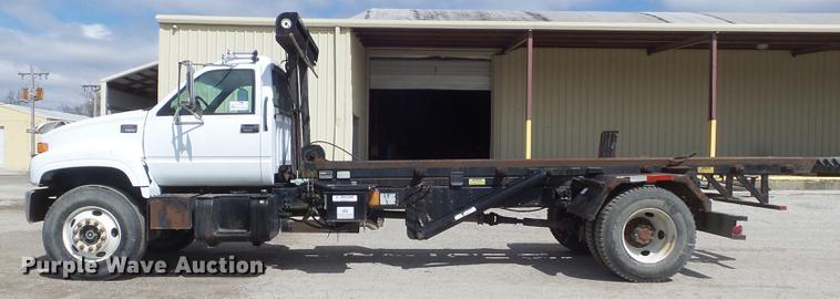 image for item DC7367 1999 GMC C7500 roll-off container truck