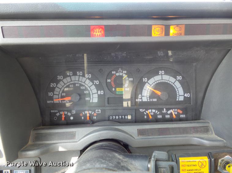 image for item DC7367 1999 GMC C7500 roll-off container truck