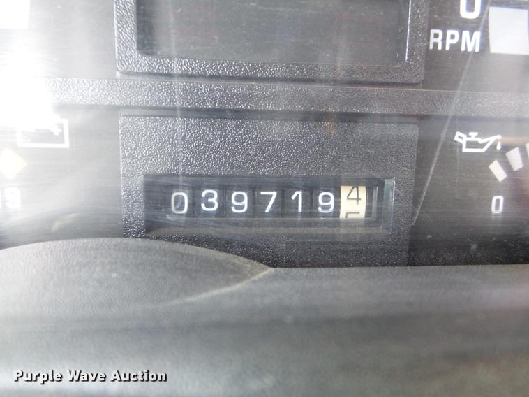 image for item DC7367 1999 GMC C7500 roll-off container truck