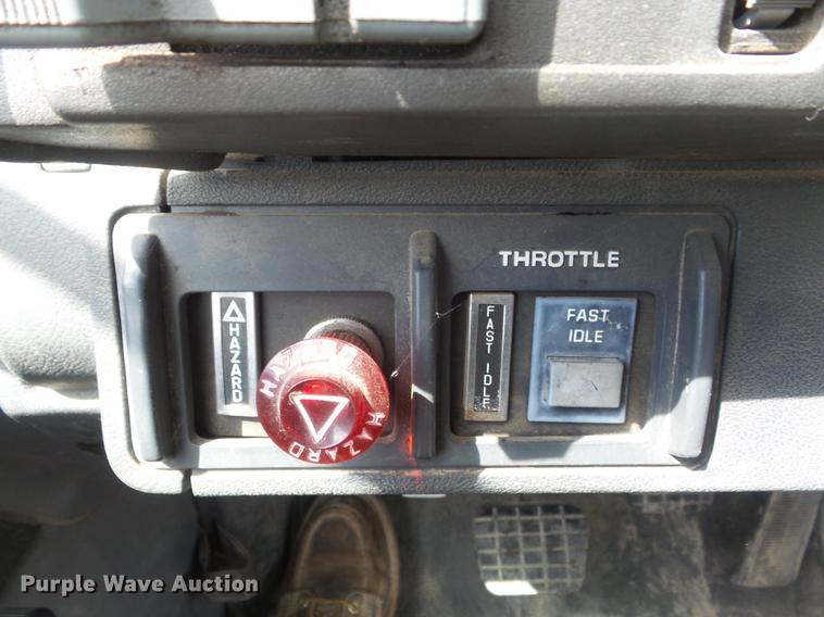 image for item DC7367 1999 GMC C7500 roll-off container truck