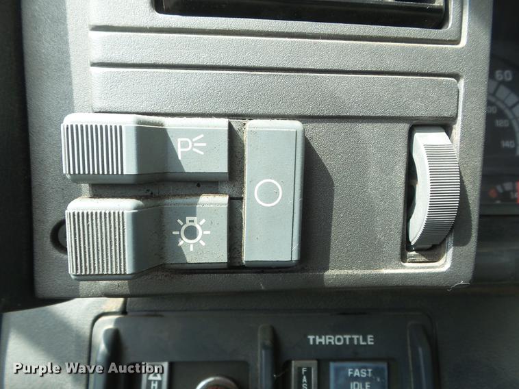 image for item DC7367 1999 GMC C7500 roll-off container truck