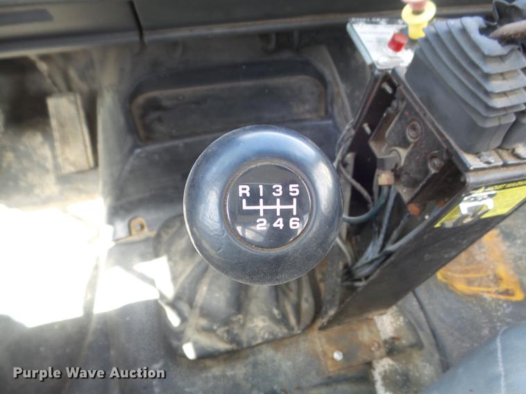 image for item DC7367 1999 GMC C7500 roll-off container truck