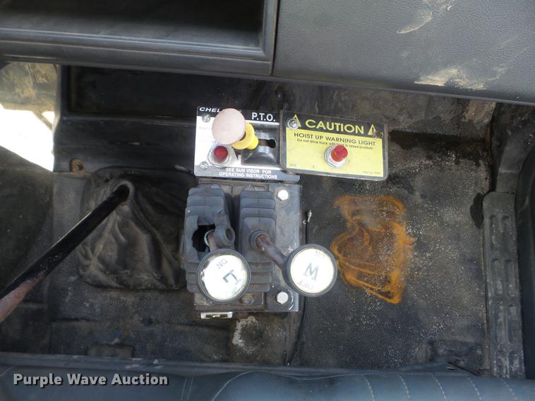 image for item DC7367 1999 GMC C7500 roll-off container truck