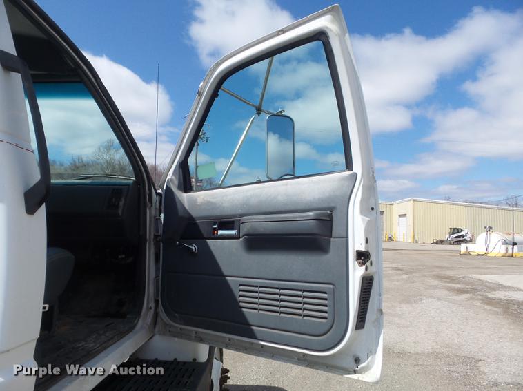 image for item DC7367 1999 GMC C7500 roll-off container truck