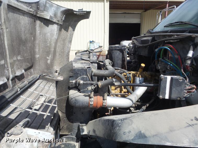 image for item DC7367 1999 GMC C7500 roll-off container truck