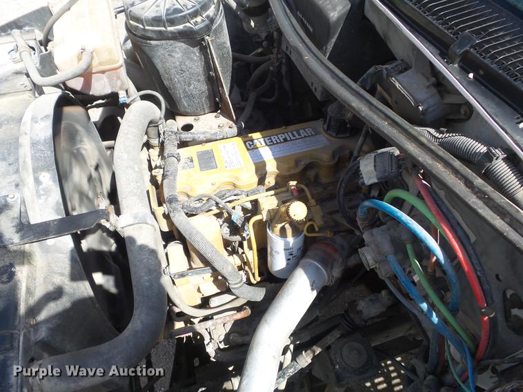 image for item DC7367 1999 GMC C7500 roll-off container truck